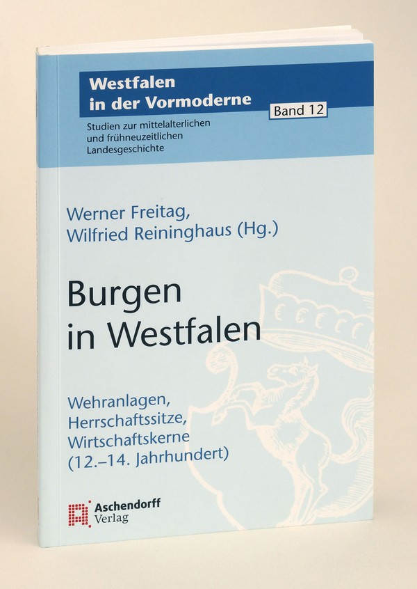 Auf der bläulichen Vorderseite des Buches ist das Wappen von Westfalen in weiß zu sehen